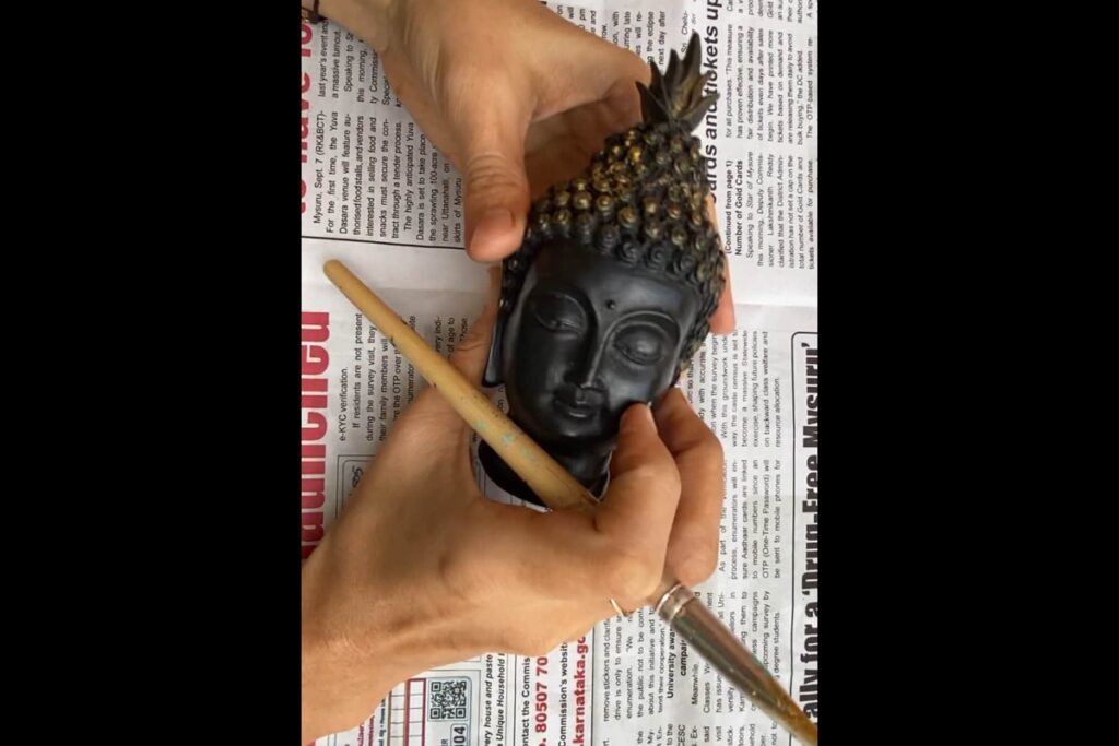 Repainting Old Buddha Statue